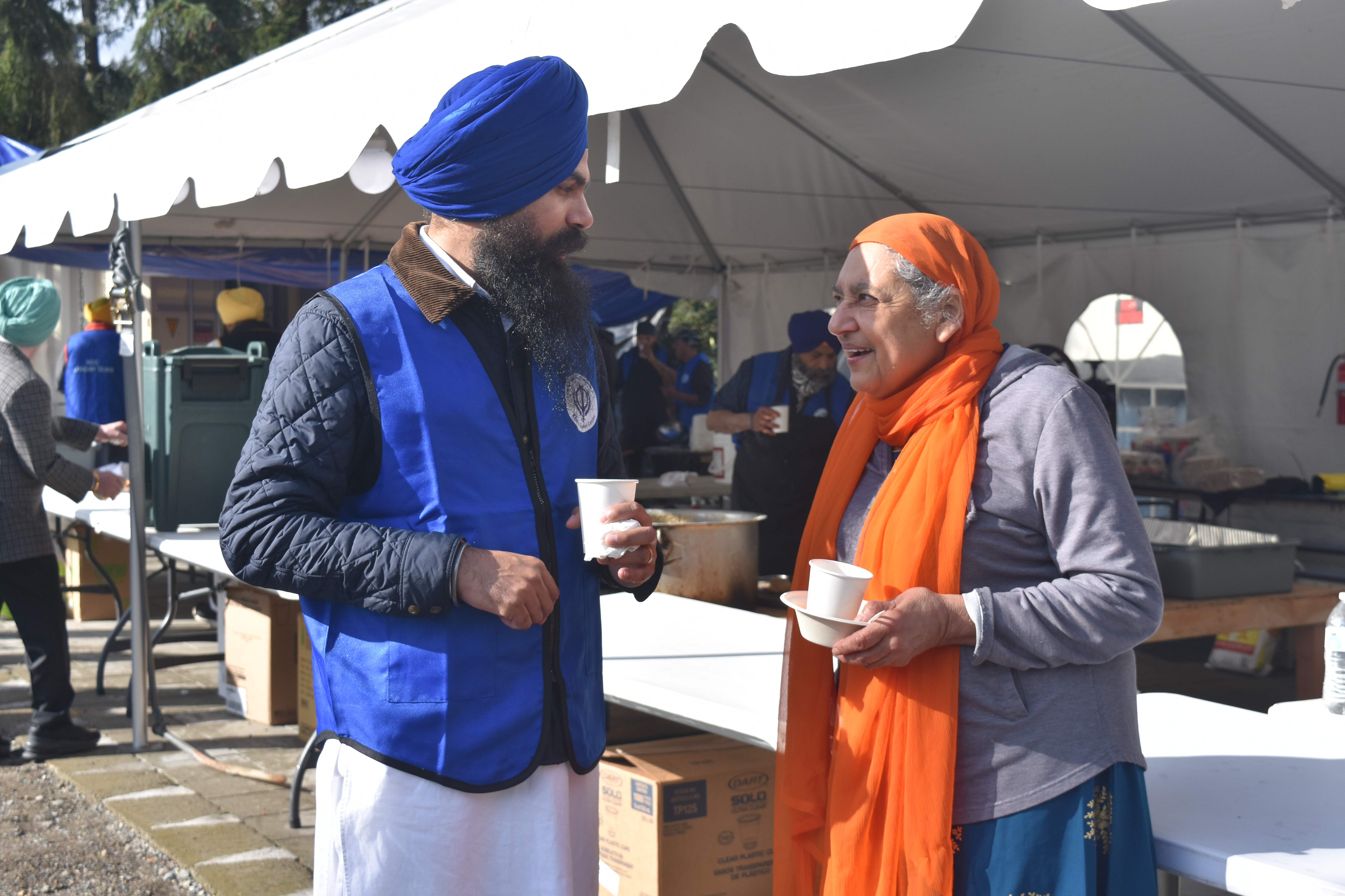 Khalsa Gurmat Center community members connecting at an outdoor event